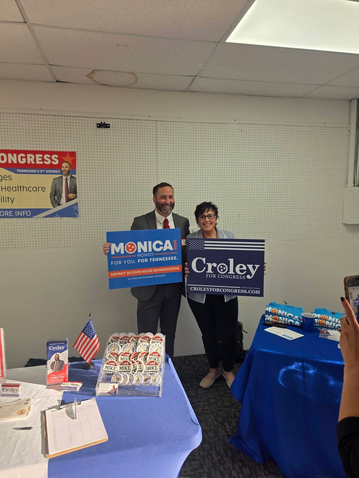Monica with a fellow Democratic candidate holding campaign signs