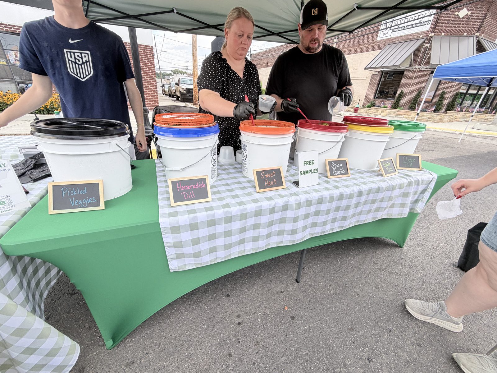 Volunteers serving drinks at Crossville Downtown Crossroads