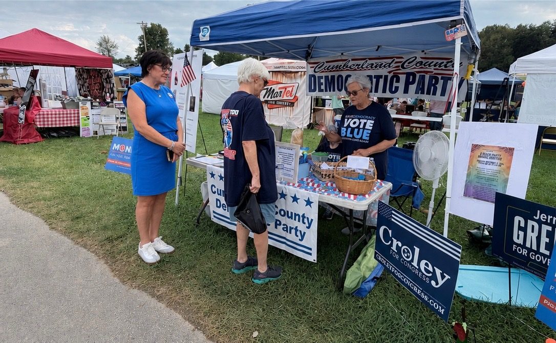 Visitors at the Cumberland County Fair Democratic Party tent