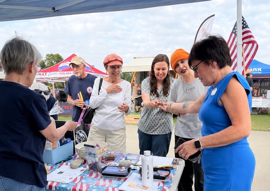 Community members gathered at the Cumberland County Fair Democratic Party tent