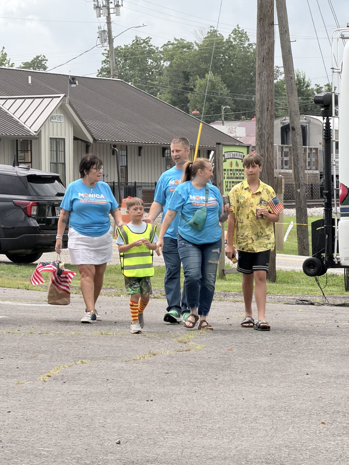 Campaign supporters walking along the street during the Monterey Fire in the Mountain festival