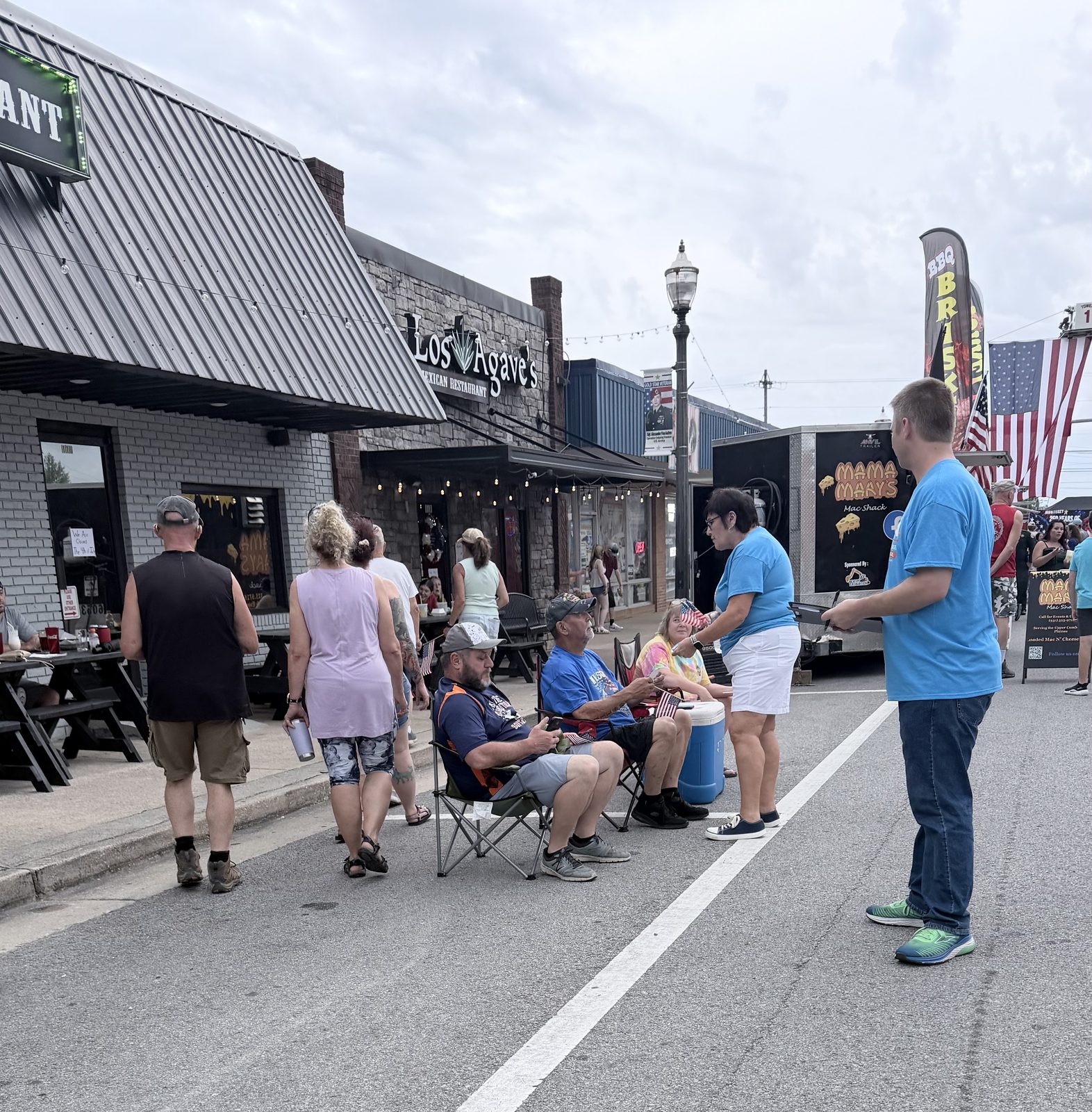 Campaign volunteers along Main Street during the Monterey Fire in the Mountain festival